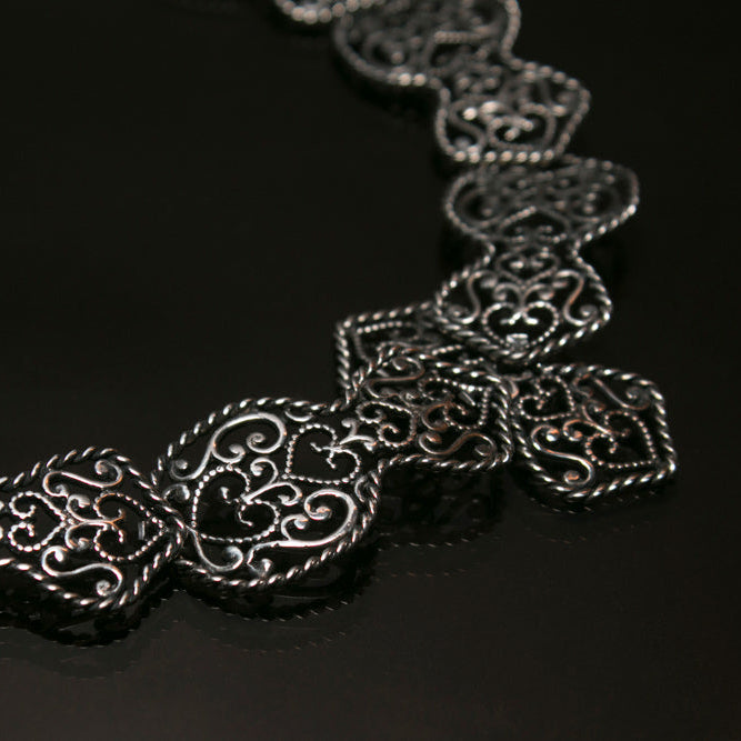 "Silver wide filigree ornament choker"